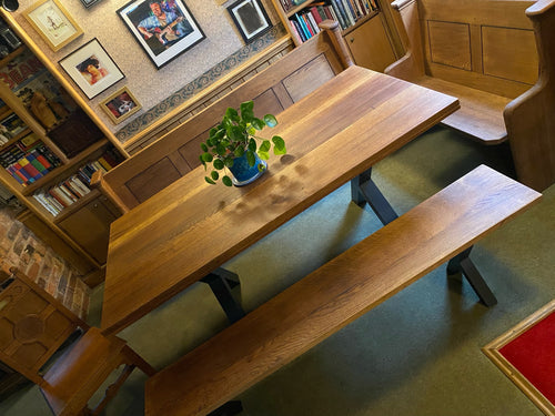 Oak table. Made from reclaimed pews. Stunning, solid, substantial tables.