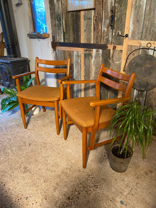 Two Meredew chairs with original upholstery.