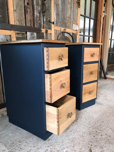 Two solid oak slimline bedside tables with drawers.